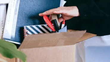 Woman Organizing Her Belongings