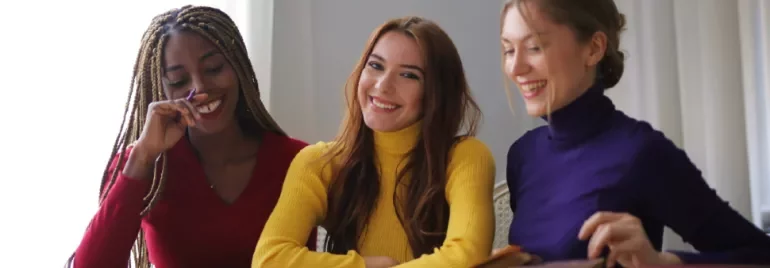 friendship at work, three women laughing