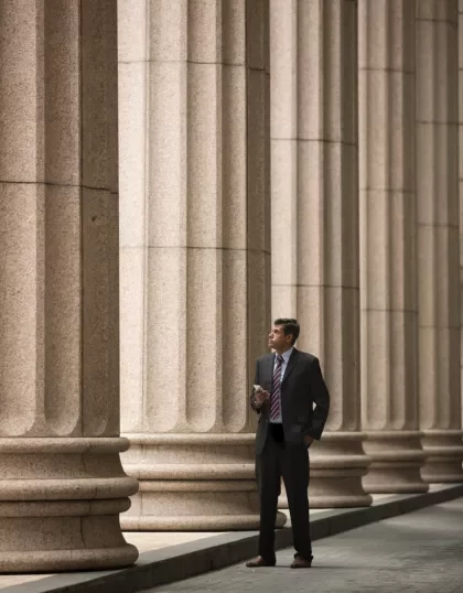 Executive walking down a hallway