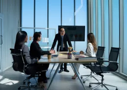 Group of working professionals talking