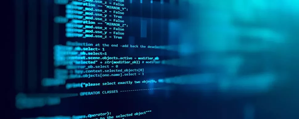 Close-up view of computer code on a blue screen.