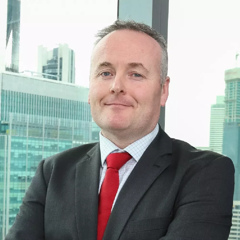 Businessman in a suit with a red tie