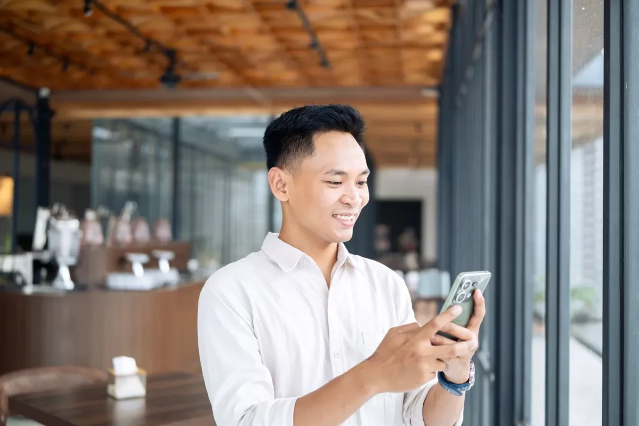 Executive working on his phone
